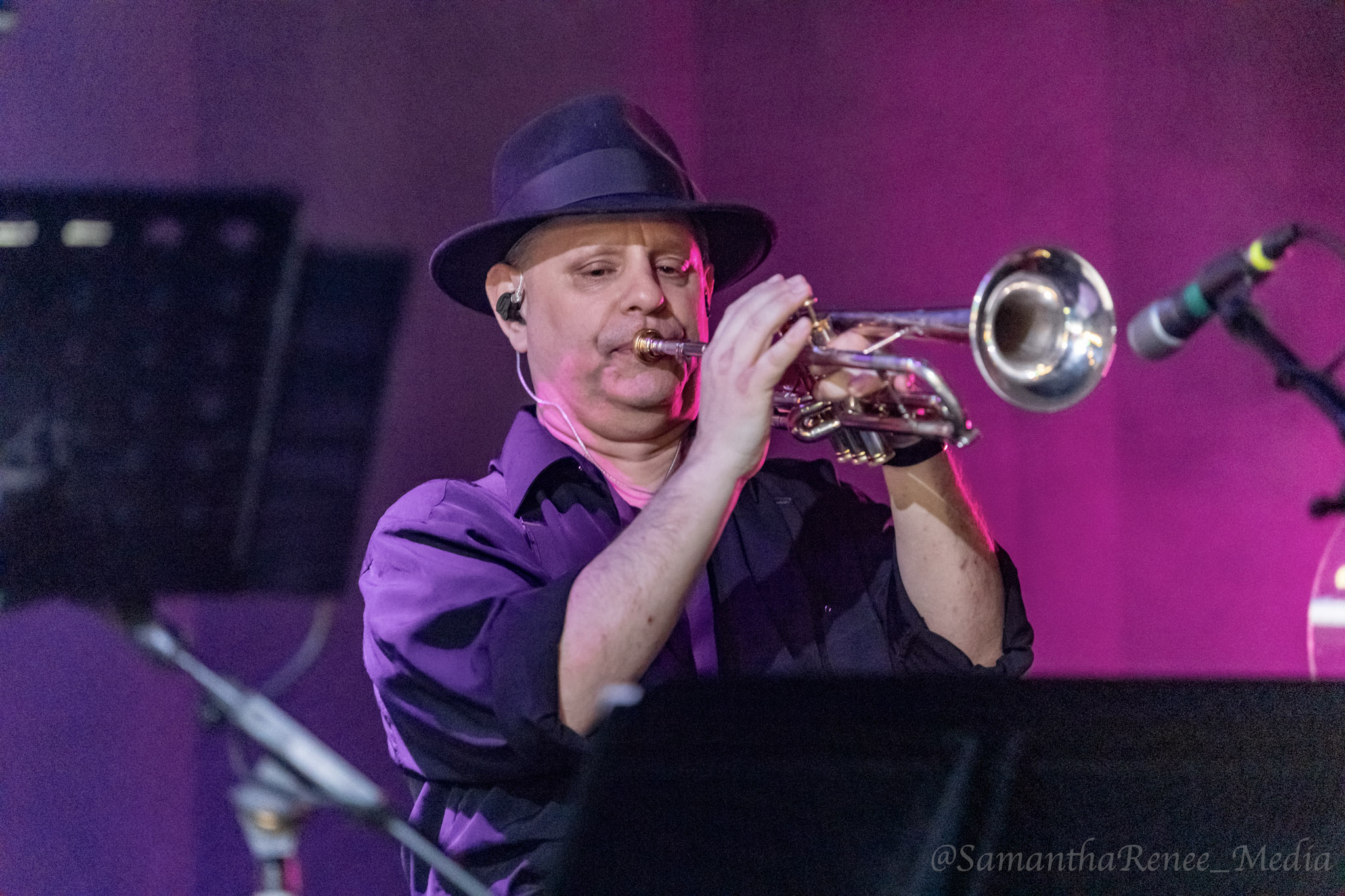 john lennon tribute band member on trumpet