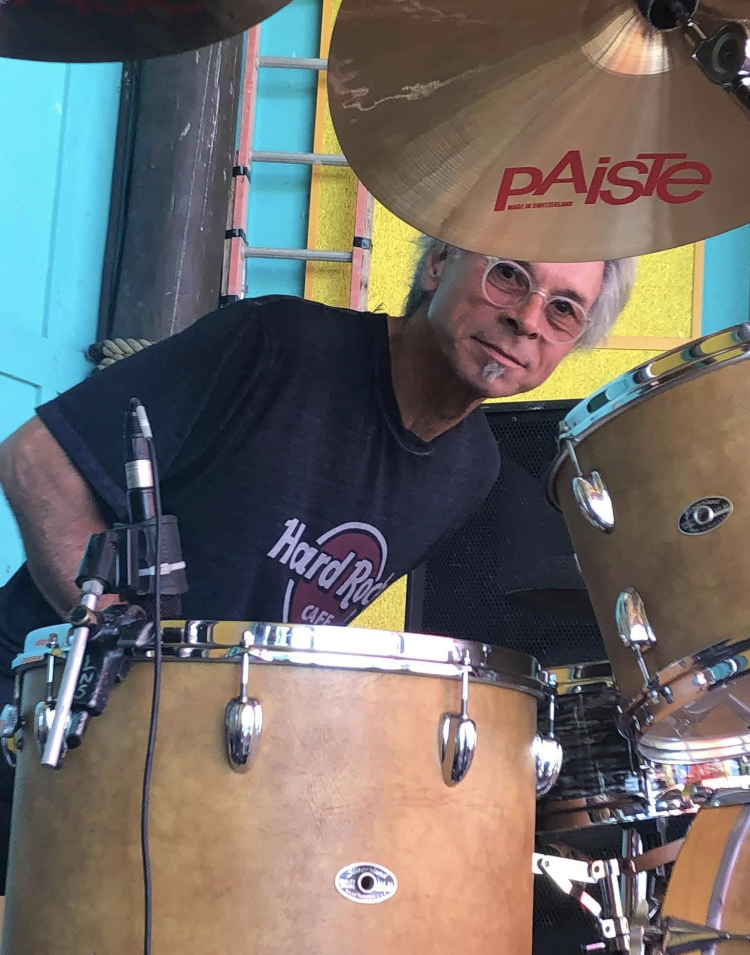 john lennon tribute band member on drums