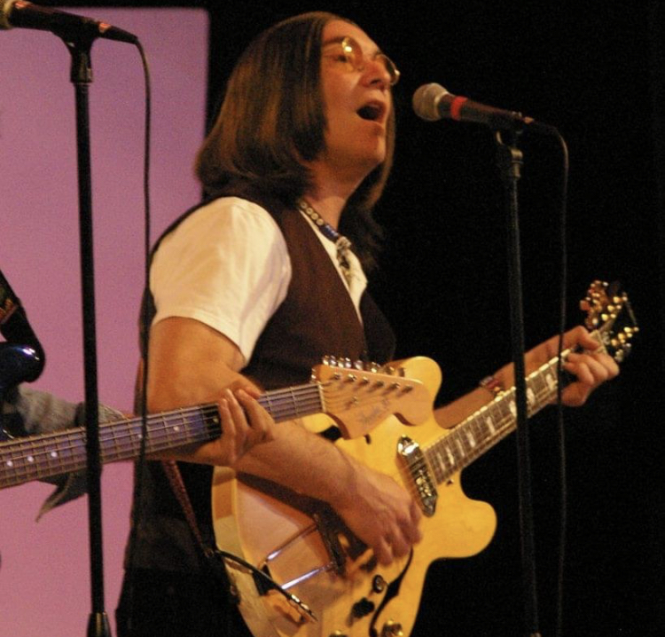 lead singer john lennon tribute band